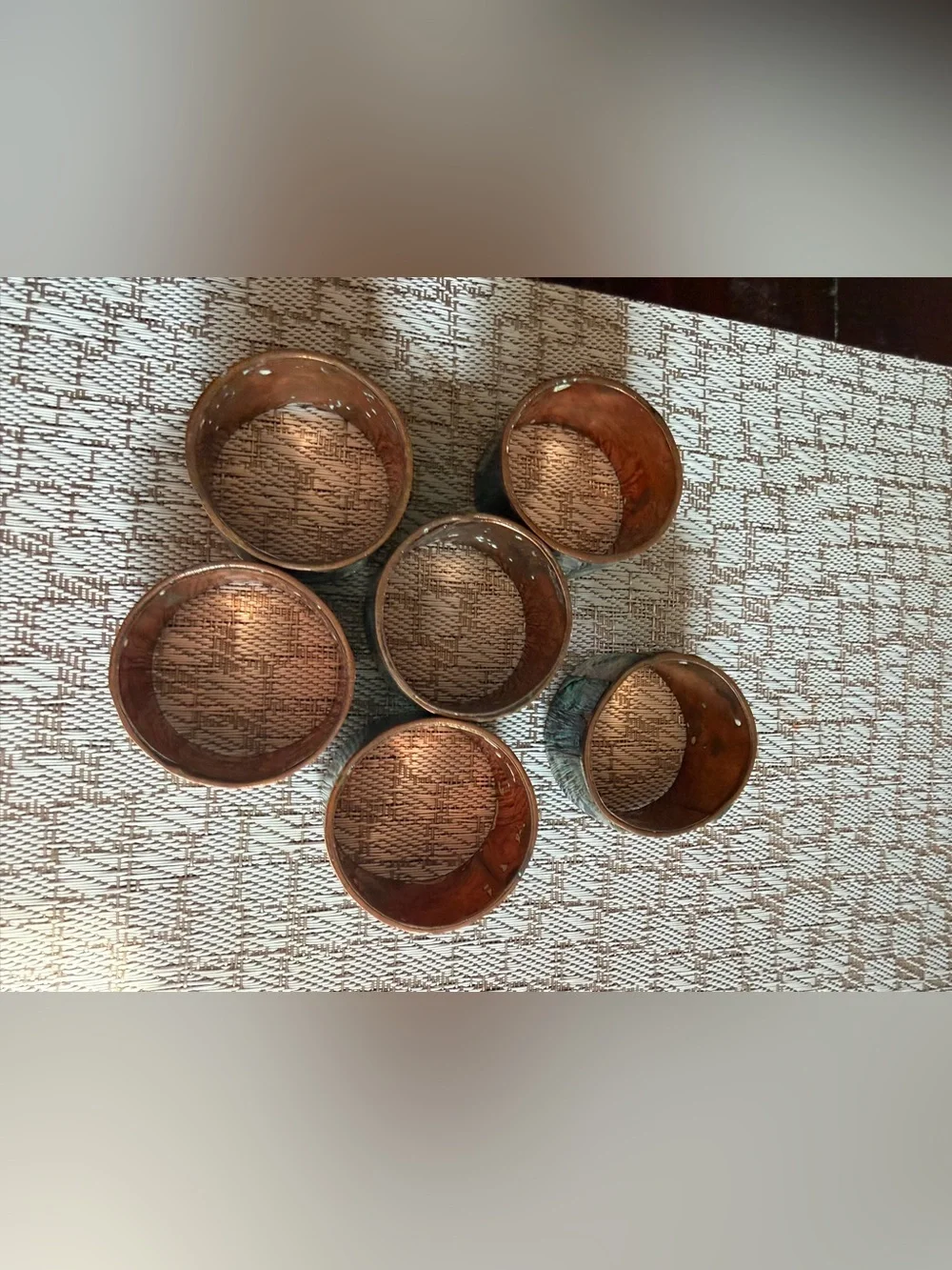 Copper and abalone shell napkin rings